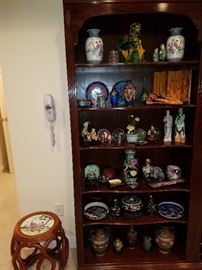 One of the 4 sections of bookcases displaying items for sale