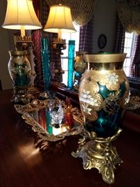 Gilt trim blue vases mounted on metal basis