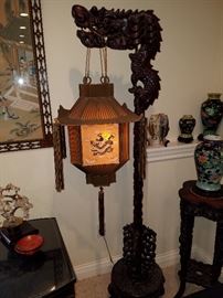 Early 20th century carved dragon floor lamp with period embroidered silk shade in great condition.  This is stunning.....