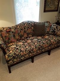 Upholstered camel back sofa with label from Klingman's (see next photo)