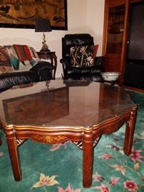 A side view of the Kindel table, as shown on the Chinese rug