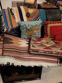 Rugs.  Note the losses on the Navajo rug to the right of center.