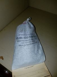 A bag of additional shelf brackets