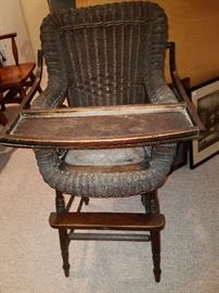 Wicker high chair, Ca. 1890.  Has the appearance of a Heywood-Wakefield piece, but no label found.  Original finish on the wicker....and still has its tray!