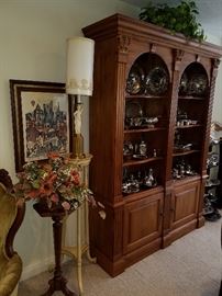 Plant stands, Double arch bookcase (Not for sale) housing collection of silverplate hollow ware.