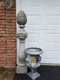 A pair of pedestals, and a pair of urns 