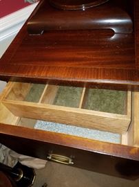Inside the top drawer of the mahogany stand in previous picture