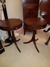 Pair of leather top small stands made by the "Fine Arts Furniture Co, Grand Rapids, MI"