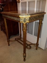 French gilt wood table with onyx top inset
