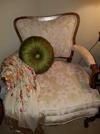 Upholstered chair from Klingman's. Embroidered silk fringed shawl.