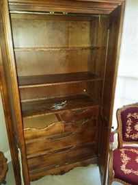 Armoire displayed open.