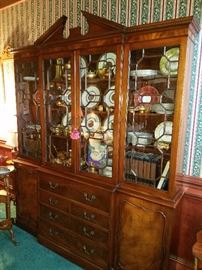 Mahogany breakfront/secretary by the Baker Furniture Company.  This is illustrated in their old catalogs and was the largest piece Baker made.  Inside:  Pickard and other china