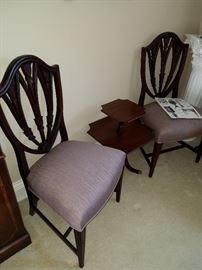 A pair of Shield back side chairs and a diminutive two-tier stand