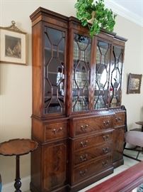 Baker at its best!  True divided light windows in this 4 door breakfront/Secretary made of mahogany with inlaid accent woods.  This piece was a signature piece in the Baker display at the old Furniture Exhibition Building downtown Grand Rapids when Baker was operating and exhibiting there. 