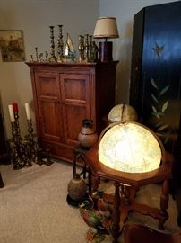 Lighted globe (touch on/off), Cabinet with TV, Misc. candlesticks and other items