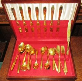 Dorsheimer GOLD FLATWARE ON BENCH