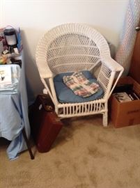 Wicker chair. In bedroom