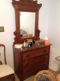 Victorian era dresser with brown marble top