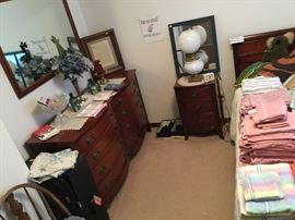 Mahogany bedroom set, dresser, end table full size bed and mattress with linens