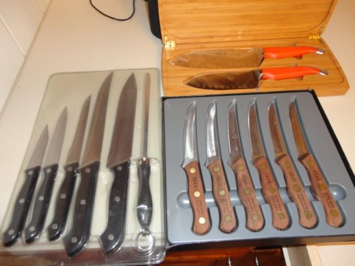 Tons of knives and kitchen cooking items