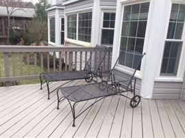 A pair of deck Lounge chairs