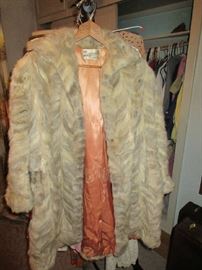 Real fur coat labeled E.R. Bedell's Tailoress & Modiste