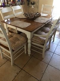 French Country style kitchen table with bench style seats 