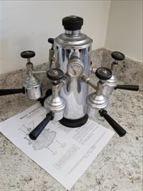  Vintage Espresso Machine  http://www.ctonlineauctions.com/detail.asp?id=691065