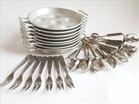  Escargot Serving Set for 8 http://www.ctonlineauctions.com/detail.asp?id=691077