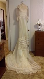 Another vintage wedding dress with a beautiful train