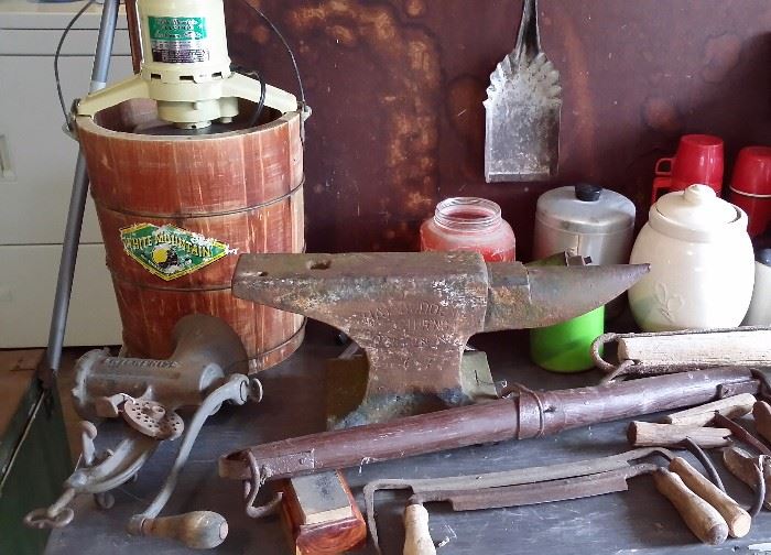 Antique ice cream freezer, meat grinder, single tree, tools