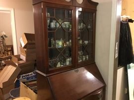 Shelving on secretary -miscellaneous items inside