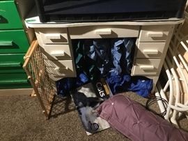 Desk, dog gate, decorative pillows