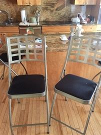Bar height folding chairs.  5 available.