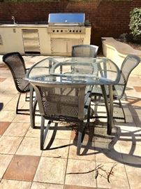 Brown Jordan outdoor table and chairs.  Grill not for sale.