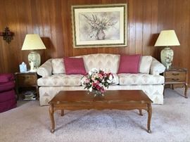 Huntington House, custom-upholstered sofa; pecan coffee and end tables with drawers.  