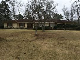 Large 4 bedroom, 2 1/2 bath home built in 1963;plus two-car carport; large office and laundry room.  .76 corner acre lot with large private patio.  Open concept; lots of light.  Will go on the market soon.