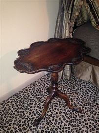 Delicately carved side table