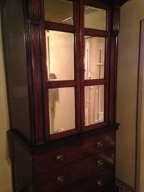 Armoire provides great shelf and drawer storage.