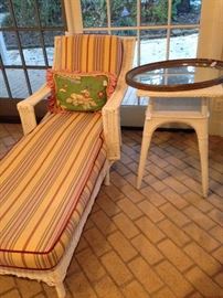  White wicker lounger and side table