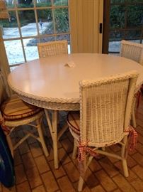 White wicker table & 4 chairs