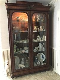 French two drawer china cabinet with two beveled glass paned doors