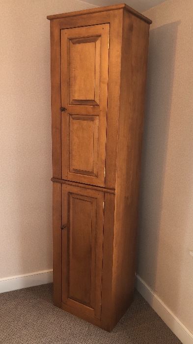 Matching tall, narrow cupboard storage - 