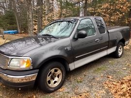 Ford 150 - 2003 with 170,000. 2-WD. New battery, custom exhaust and runs well. Needs rocker panels to be replaced - but don't worry! We have them for you!