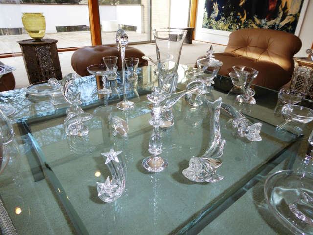 Large Collection of Steuben Crystal, including Decorative Pieces, Candlesticks, Animals, Chess Pieces, Stemware, Plates, etc. Coffee Table Not for Sale.