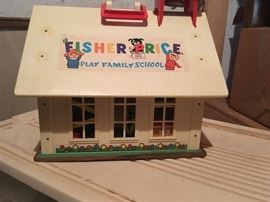 The vintage Fisher Price toys in this sale are outstanding! This is a Play Family School house that features letters of the alphabet and more!