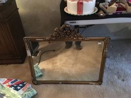 This mirror is really nice. It has some plaster broken off, but the pieces have been saved.