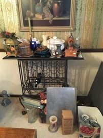 This is a beautiful table-style wine rack in wrought iron.