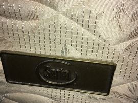 This is the "Serta" brass lable on the double pillow top king mattress set.