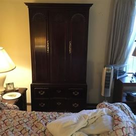 The picture does not do justice to this beautiful Henredon wardrobe.